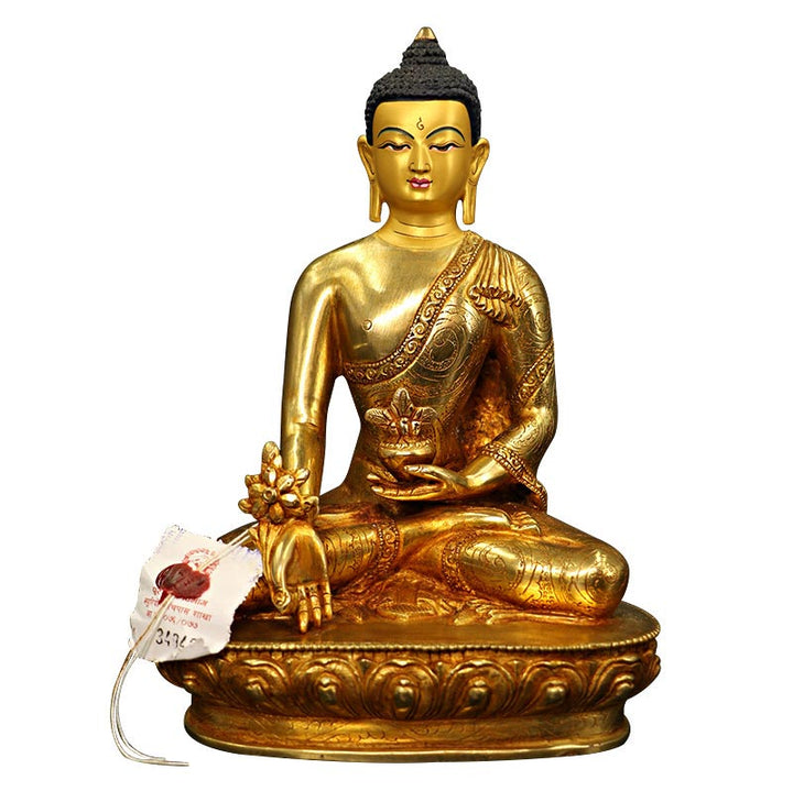 Statua di Buddha Shakyamuni Buddha della medicina Compassione in rame placcato oro Decorazione