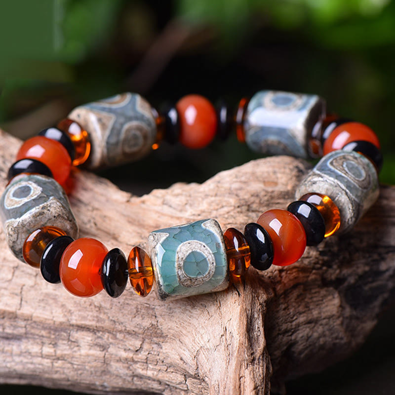 Braccialetto di protezione della felicità con perline Dzi a tre occhi tibetane Buddha Stones