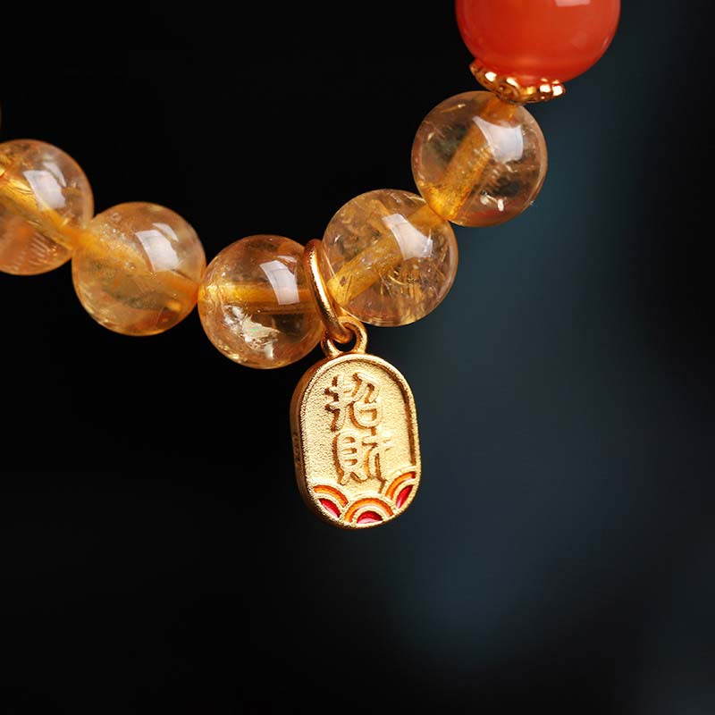 Braccialetto con ciondolo della fortuna in agata rossa e citrino Buddha Stones