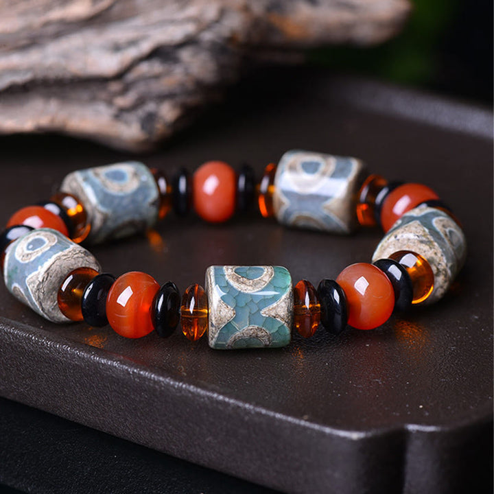 Braccialetto di protezione della felicità con perline Dzi a tre occhi tibetane Buddha Stones