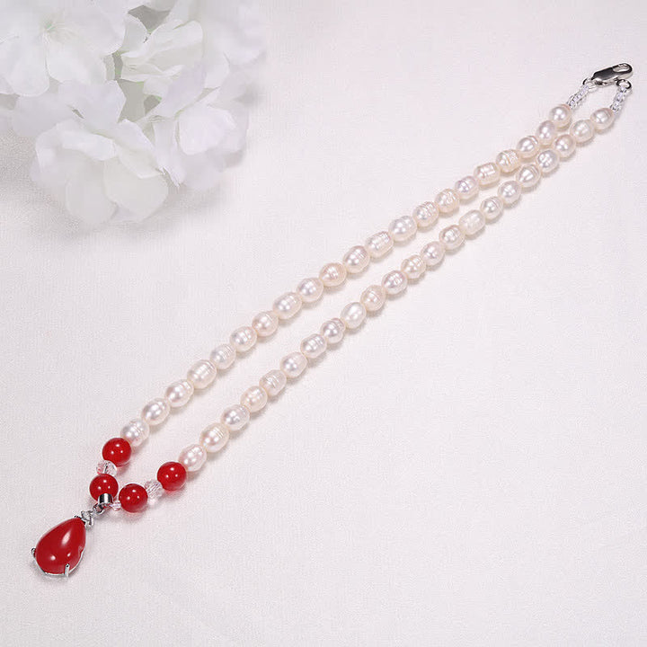 Collana con ciondolo a forma di goccia d'acqua e perla, calma e pace