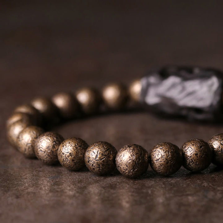Braccialetto di perline di pace, equilibrio, in rame, legno di ebano del Tibet, Buddha Stones