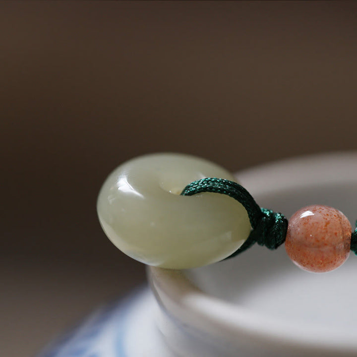 Collana con ciondolo in corda con fibbia della pace in giada rotonda naturale Buddha Stones Lotus Abundance - image 3