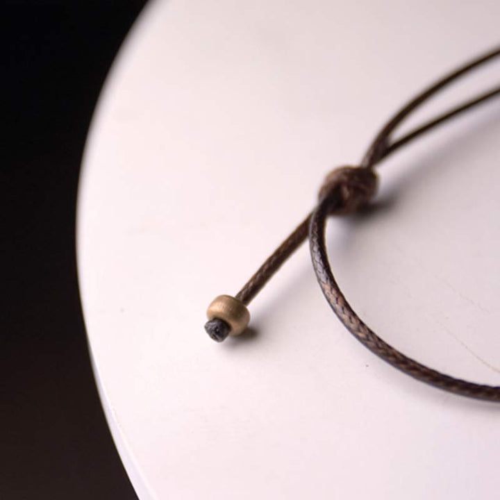 Collana con ciondolo in legno di ebano e cerchio zen Buddha Stones , illuminazione