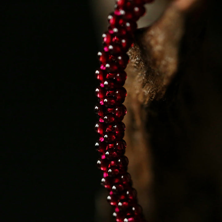Braccialetto di protezione con perline di agata rossa, cristallo rosa e granato naturale Buddha Stones