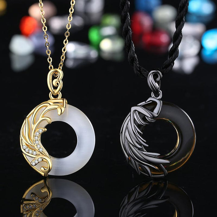 Collana con ciondolo rotondo da meditazione in ossidiana e calcedonio Buddha Stones