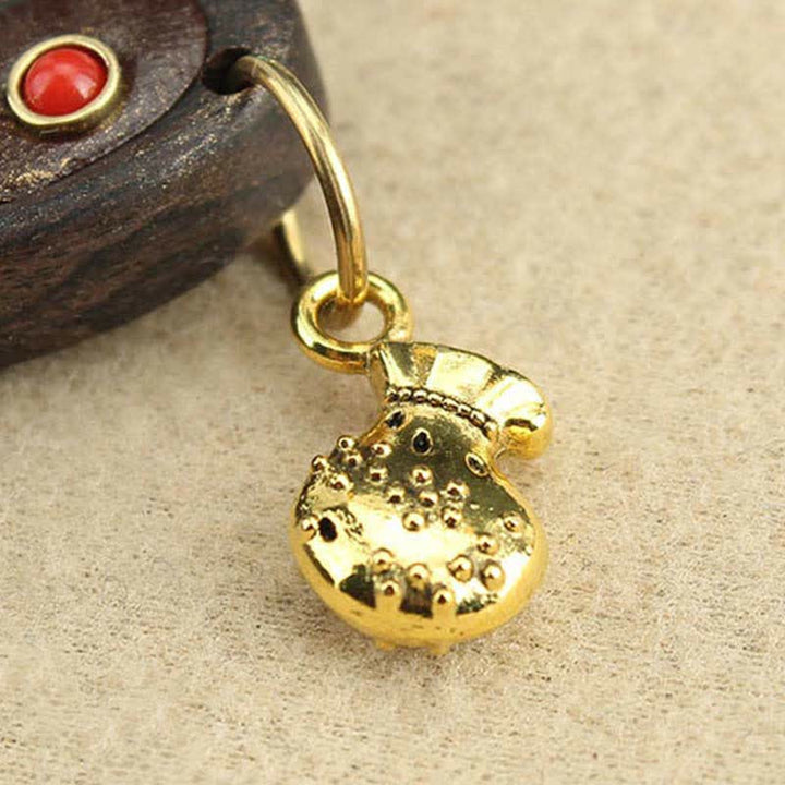Collana pendente Thangka con cinque divinità della ricchezza in ebano tibetano