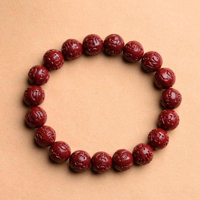 Braccialetto di benedizione del loto con motivo a fregi in cinabro naturale Om Mani Padme Hum Buddha Stones