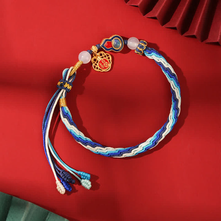 Braccialetto con nodo della reincarnazione in corda di benedizione di zucca fatto a mano in argento sterling 925