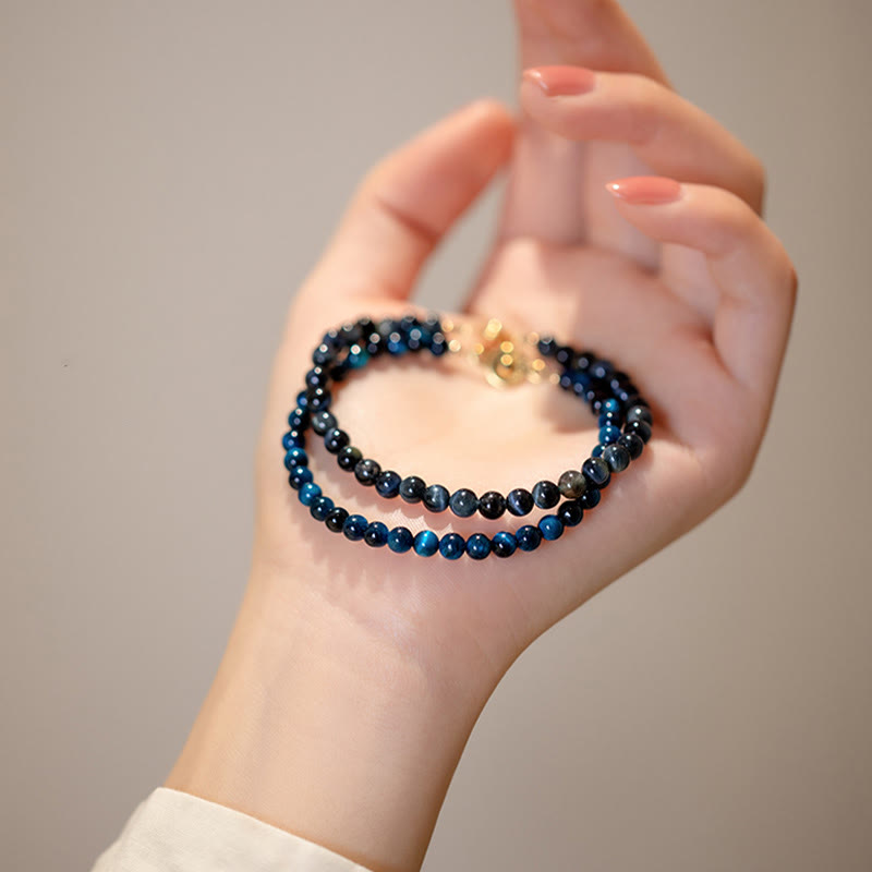 Braccialetto di protezione con catena in pietra naturale occhio di tigre blu Buddha Stones