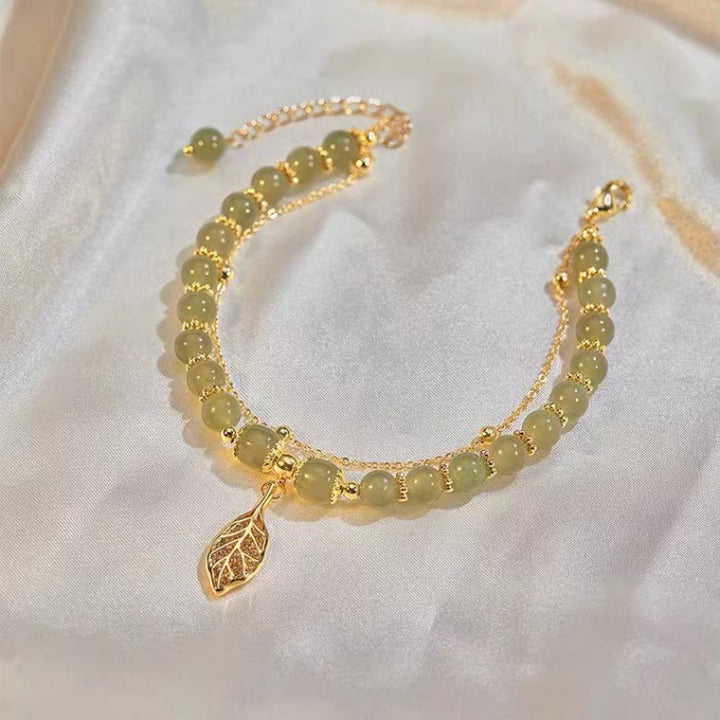 Braccialetto di perline con carattere Fu , Buddha Stones di giada, foglia di ginkgo, tulipano, arachidi e fortuna