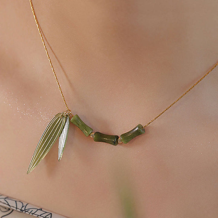 Collana con ciondolo di ricchezza in giada con foglie di bambù e Buddha Stones