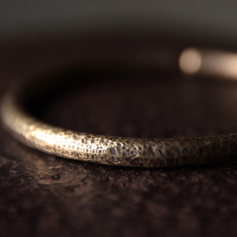 Bracciale regolabile con polsino in rame e design rustico Buddha Stones