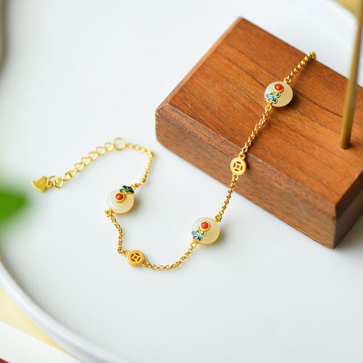 Braccialetto di rame con fibbia della pace in giada bianca e Buddha Stones