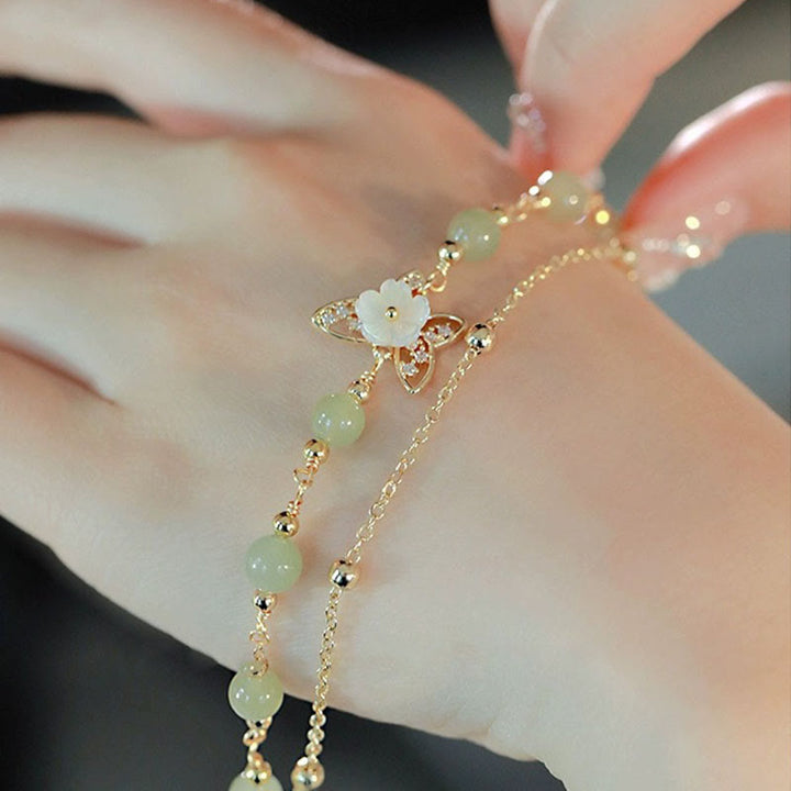 Braccialetto portafortuna a doppio strato con fiore in pietra tridacna a farfalla in giada placcato oro 14K Buddha Stones