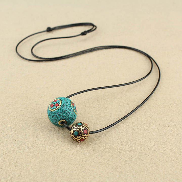 Collana con ciondolo con doppia perla turchese tibetana Buddha Stones, protezione e forza
