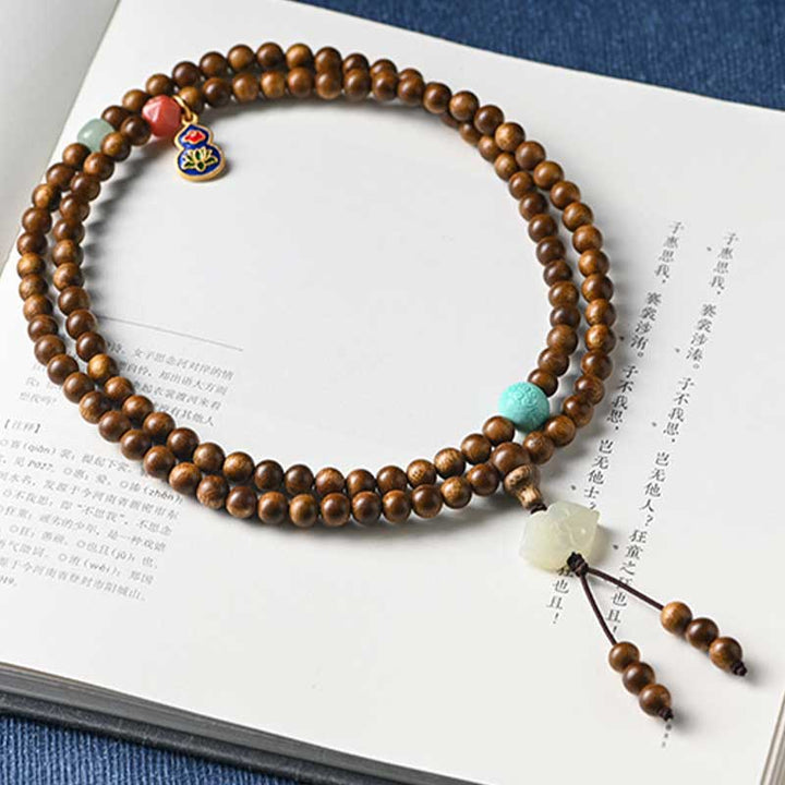 Braccialetto di protezione e calma in palissandro tibetano Buddha Stones Mala