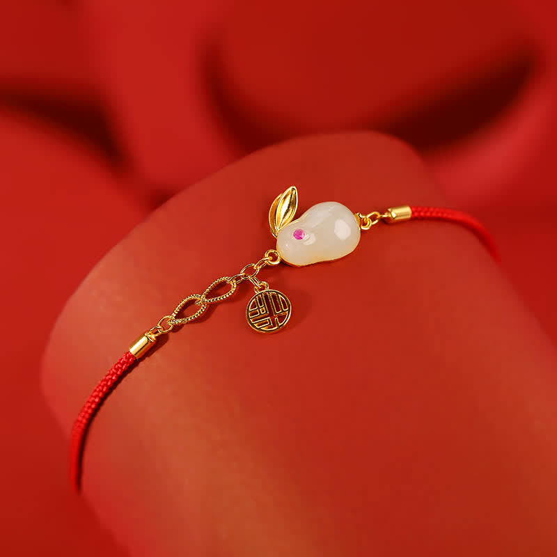 Braccialetto in argento sterling 925 con cordino rosso e giada bianca Hetian dell'anno del coniglio