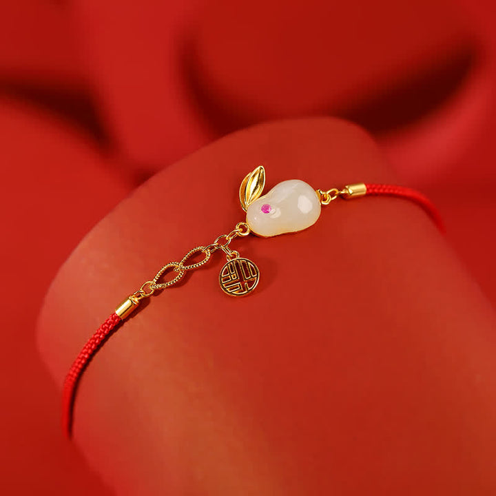 Braccialetto in argento sterling 925 con cordino rosso e giada bianca Hetian dell'anno del coniglio