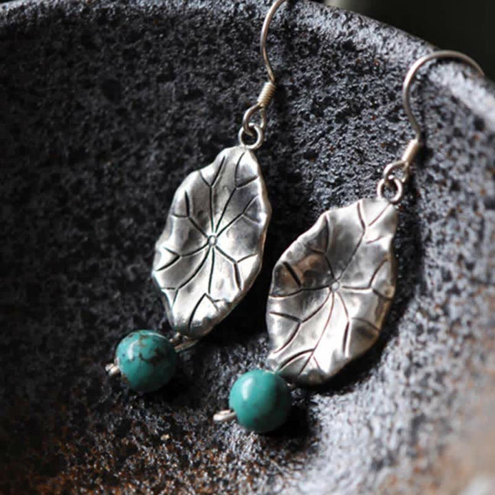 Orecchini pendenti con protezione a forma di foglia di loto turchese in argento sterling 925 Buddha Stones