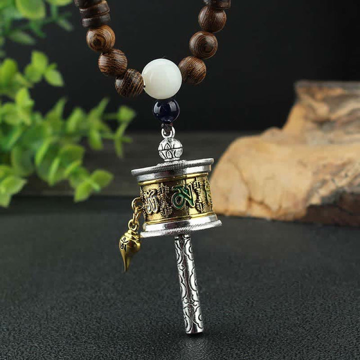Buddha Stones Tibetano Om Mani Padme Hum Ruota della Preghiera Rotazione Vajra Collana Pendente in Legno - image 2