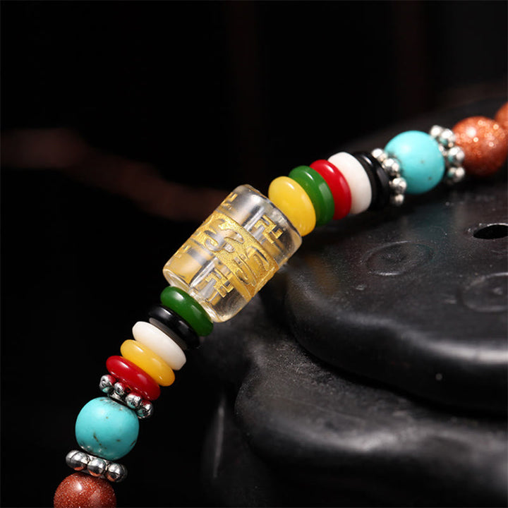 Buddha Stones 108 Mala Beads Goldstone Om Mani Padme Hum Swastika Braccialetto di Fiducia