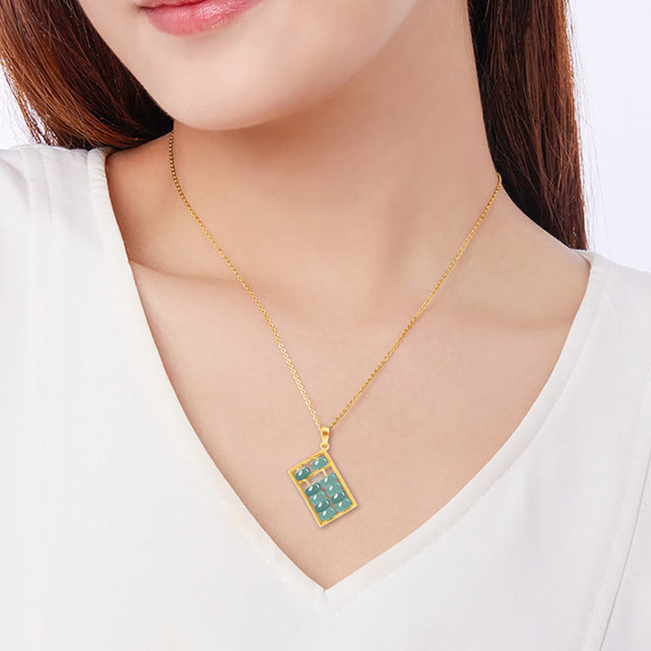 Collana con ciondolo Buddha Stones in argento sterling 925 con motivo abaco in giada naturale e motivo abbondanza