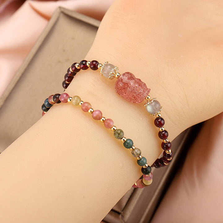 Braccialetto di protezione in pietra di luna PiXiu con quarzo fragola, tormalina naturale e granato Buddha Stones