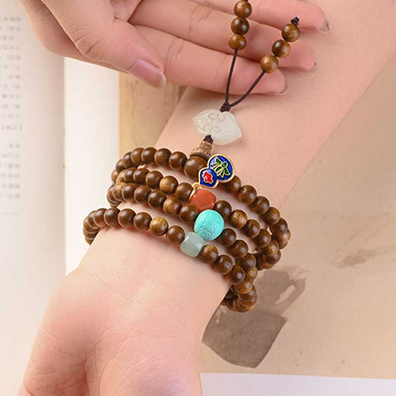 Braccialetto di protezione e calma in palissandro tibetano Buddha Stones Mala