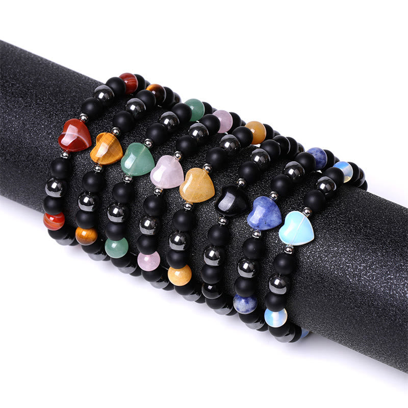 Braccialetto di protezione del cuore dell'amore di cristallo della pietra dell'occhio di tigre di onice nero Buddha Stones