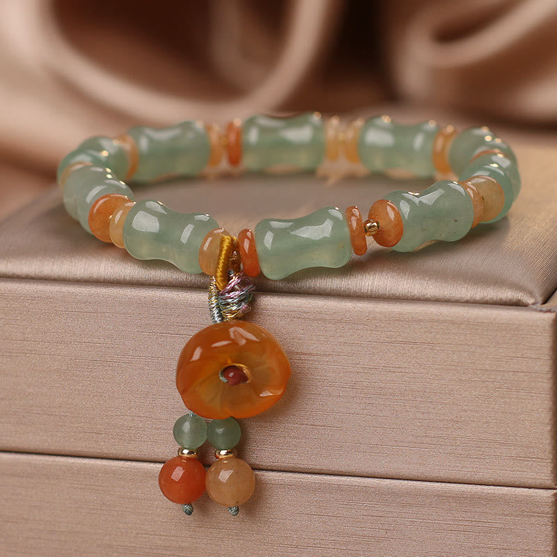 Braccialetto della fortuna con motivo a fiori di bambù e giada naturale Buddha Stones