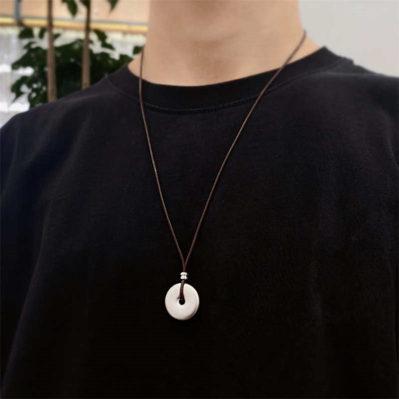 Collana con ciondolo con fibbia rotonda in argento sterling 999 con Buddha Stones e protezione per la pace