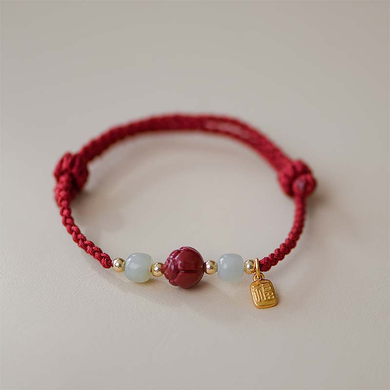 Braccialetto intrecciato con corda rossa calma, giada, cinabro e loto Buddha Stones