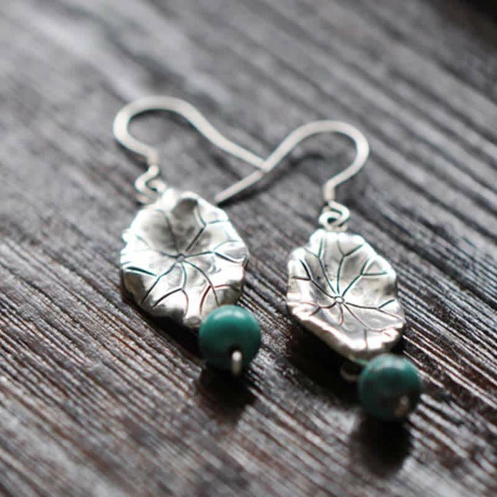 Orecchini pendenti con protezione a forma di foglia di loto turchese in argento sterling 925 Buddha Stones