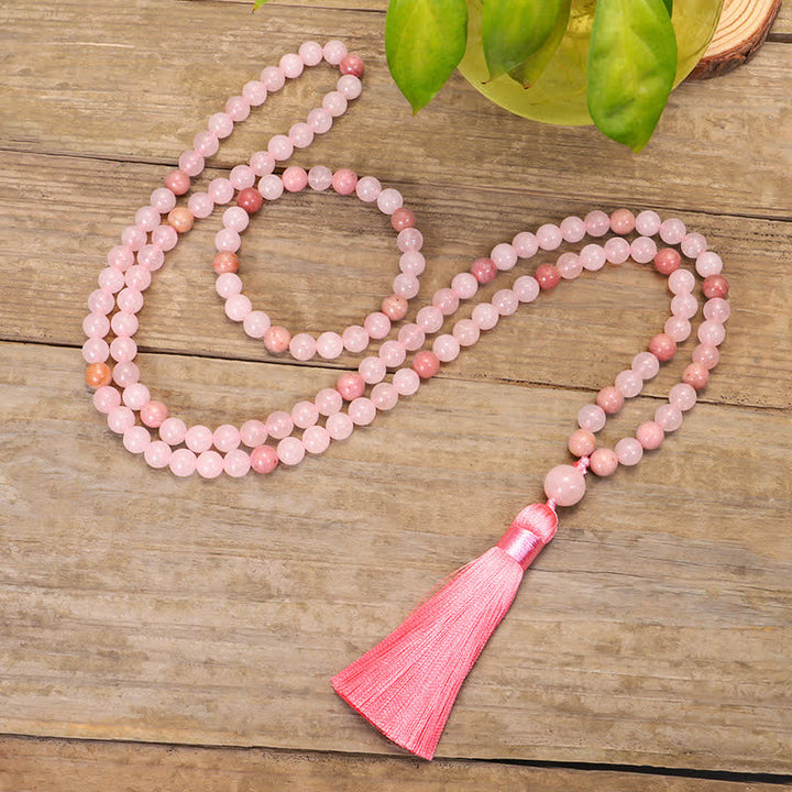 Braccialetto con nappa di cristallo rosa e 108 perle di Mala Buddha Stones