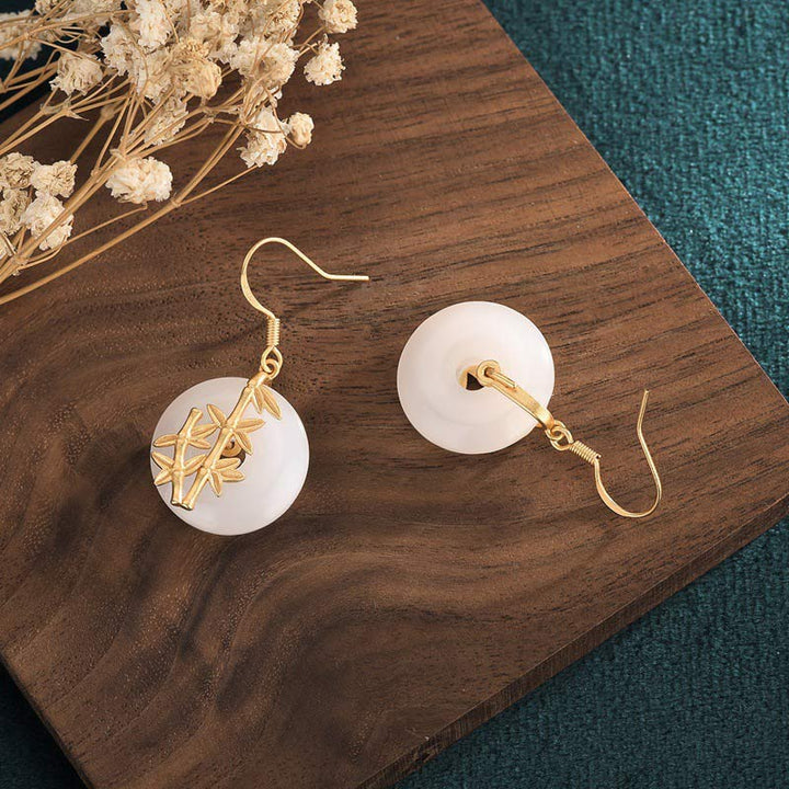 Orecchini Buddha Stones FengShui in giada bianca con fortuna