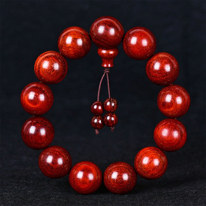 Braccialetto di equilibrio in legno di sandalo rosso con foglia piccola tibetana Buddha Stones