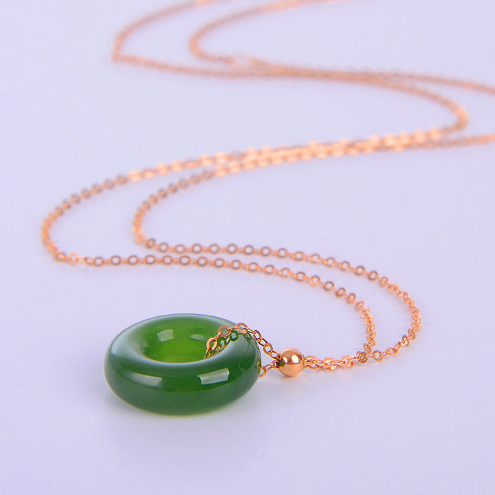 Collana con ciondolo in oro 14K con giada ciano rotonda e guarigione