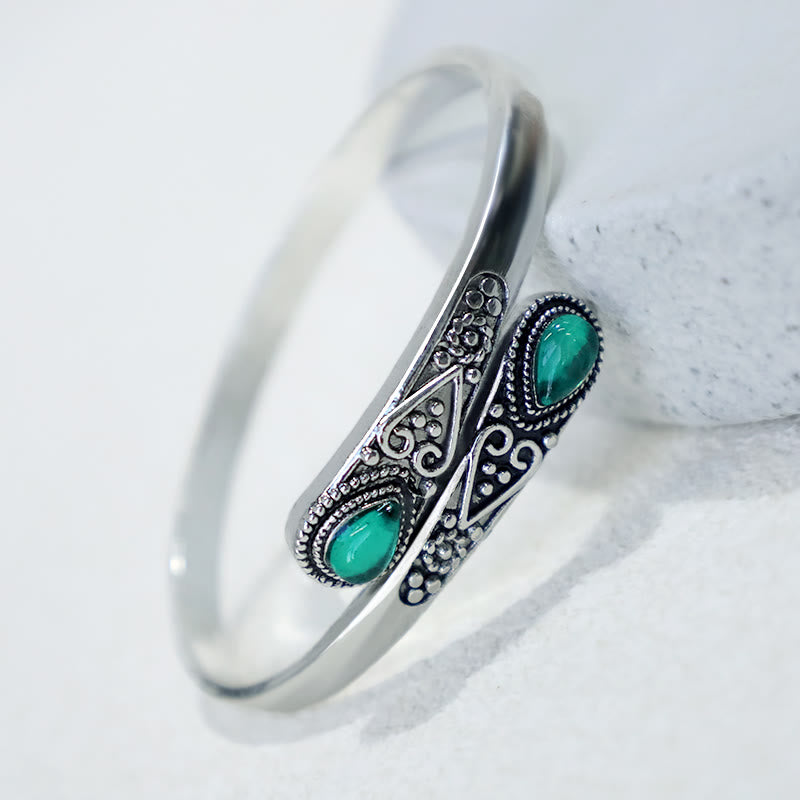 Braccialetto con polsino curativo con motivo a goccia d'acqua in zircone Buddha Stones