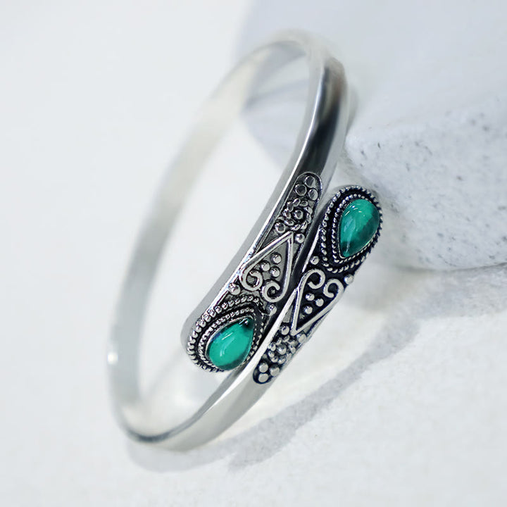 Braccialetto con polsino curativo con motivo a goccia d'acqua in zircone Buddha Stones