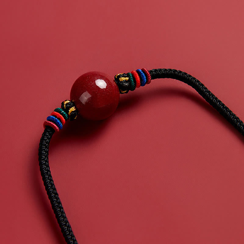 Collana con ciondolo in corda di benedizione con perline di cinabro e Buddha Stones