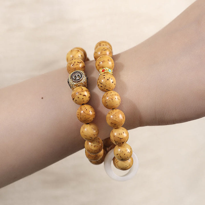 Braccialetto doppio giro Buddha Stones Tibetano Naturale Viola Oro Ratto Bodhi Seed Ricchezza