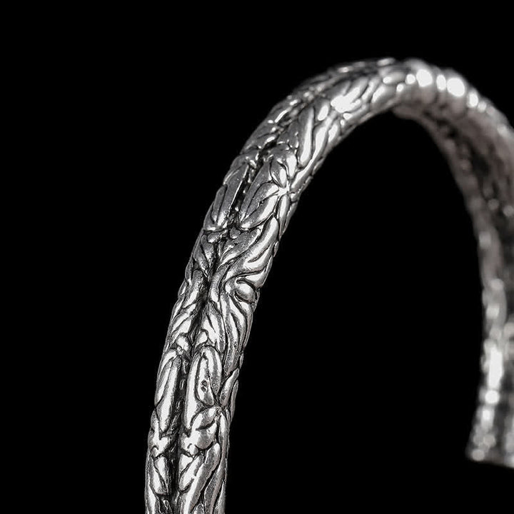 Bracciale rigido con polsino con motivo a drago inciso e bilanciamento
