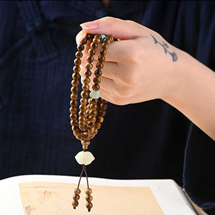 Braccialetto di protezione e calma in palissandro tibetano Buddha Stones Mala