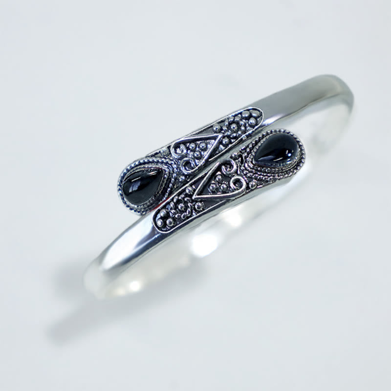 Braccialetto con polsino curativo con motivo a goccia d'acqua in zircone Buddha Stones