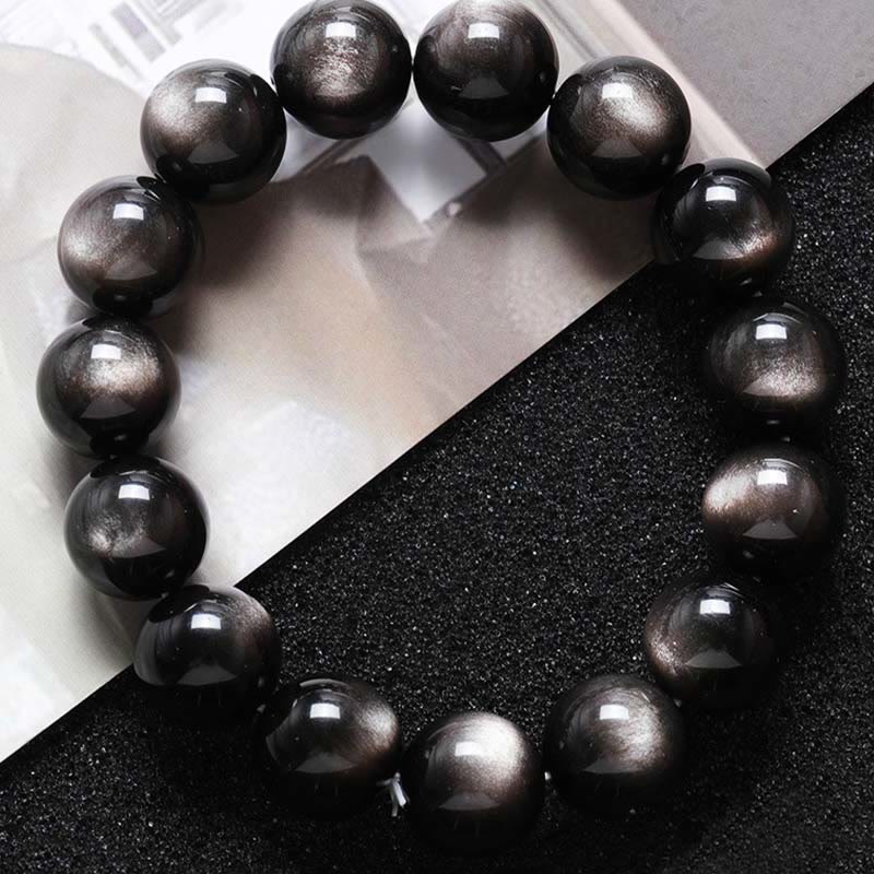 Braccialetto di protezione lenitiva in ossidiana lucida d'argento naturale Buddha Stones