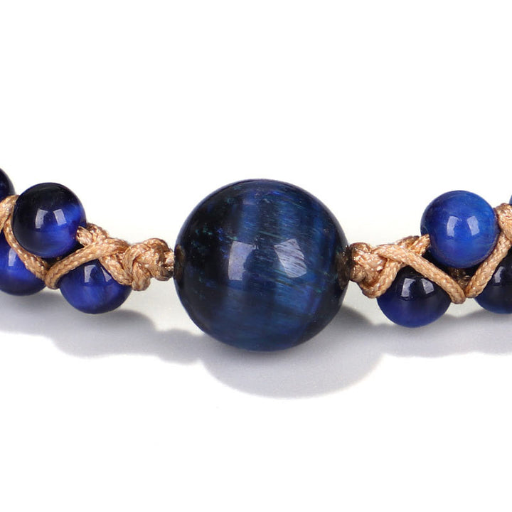 Braccialetto di protezione in pietra divina occhio di tigre blu Buddha Stones