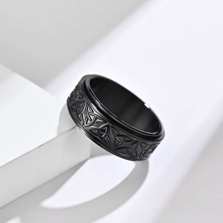 Anello girevole calmo in acciaio al titanio con nodo triangolare in Buddha Stones