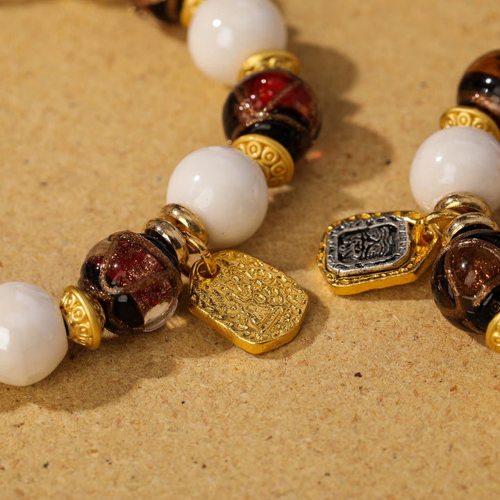 Buddha Stones Tibetano Zakiram Dea della Ricchezza Ciondolo Liuli Vetro Incenso Cenere Perline di Porcellana Braccialetto di Protezione
