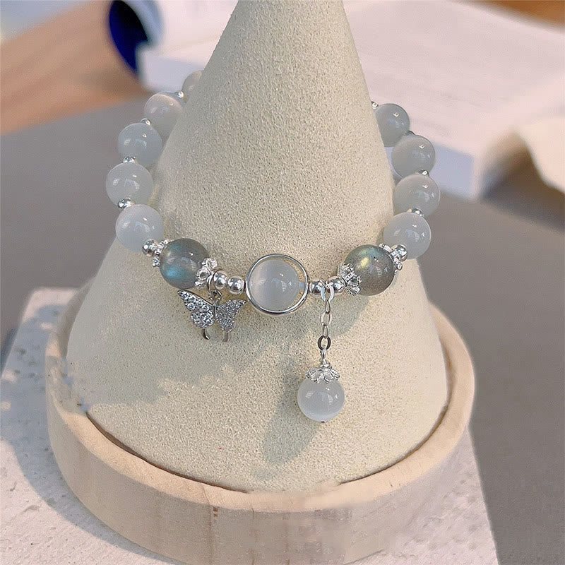 Braccialetto di supporto con ciondolo a forma di stella a forma di farfalla, pietra di luna e occhio di gatto Buddha Stones